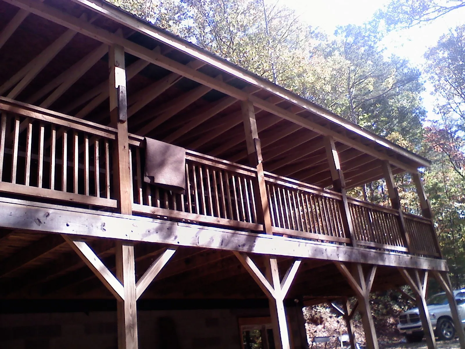 Timber framing under a new elevated porch and deck — Roof Leak Repair in Dora by Roofing Brothers